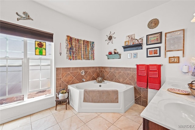 full bath with tile walls, a bath, tile patterned floors, and a sink