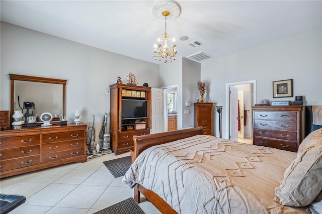 1878 E Fairway Bnd, Fort Mohave, AZ 86426 - bedroom featuring a chandelier, light tile patterned flooring, and connected bathroom