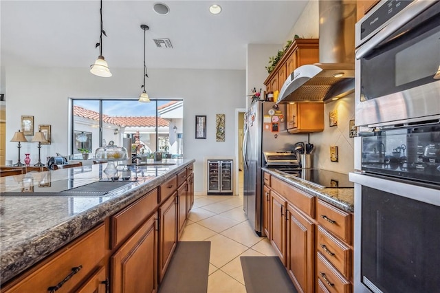 1878 E Fairway Bnd, Fort Mohave, AZ 86426 - kitchen featuring island exhaust hood, black electric stovetop, beverage cooler, brown cabinets, and pendant lighting