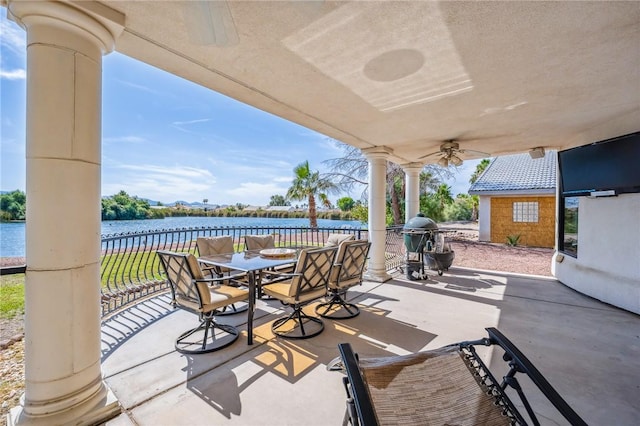 1878 E Fairway Bnd, Fort Mohave, AZ 86426 - view of patio featuring outdoor dining space, a water view, and area for grilling