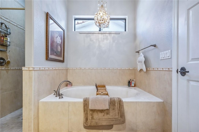 1878 E Fairway Bnd, Fort Mohave, AZ 86426 - full bath with a garden tub, a chandelier, and tiled shower