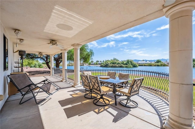 1878 E Fairway Bnd, Fort Mohave, AZ 86426 - view of patio featuring a water view, ceiling fan, and outdoor dining space