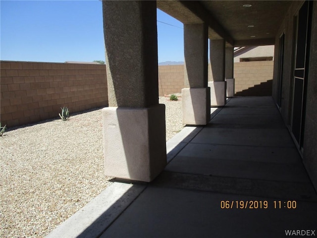 view of patio with fence