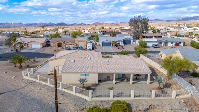 bird's eye view featuring a residential view and a mountain view