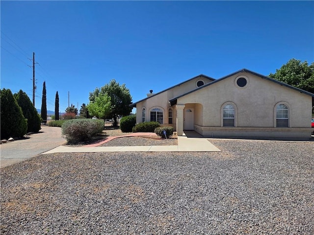 single story home with stucco siding