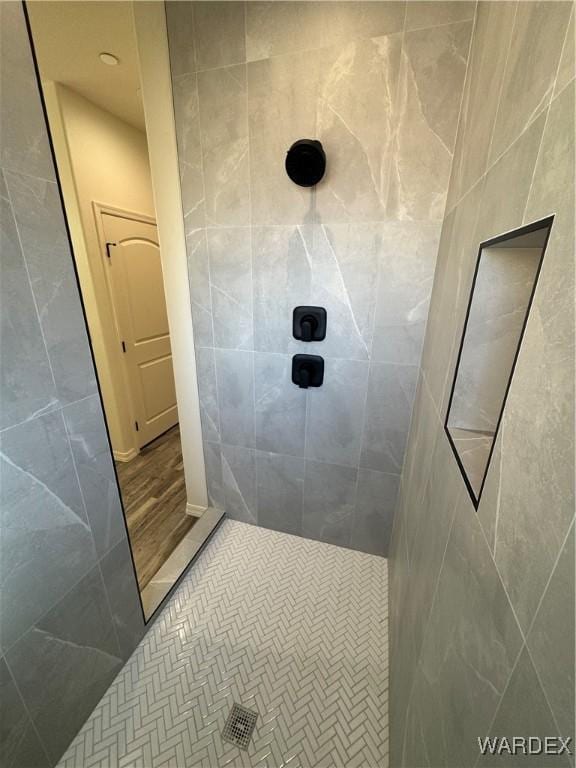 bathroom featuring a walk in shower