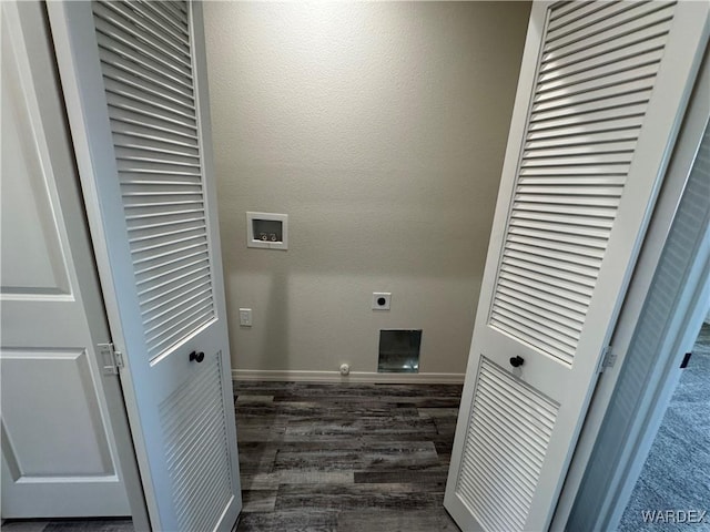 laundry area featuring laundry area, baseboards, dark wood finished floors, hookup for a washing machine, and hookup for an electric dryer