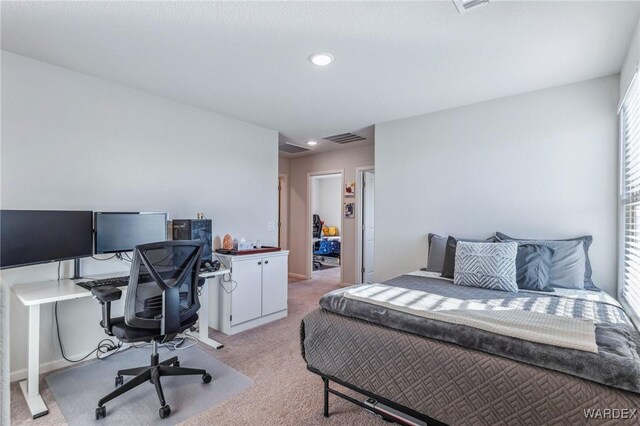 bedroom featuring light colored carpet, visible vents, and recessed lighting