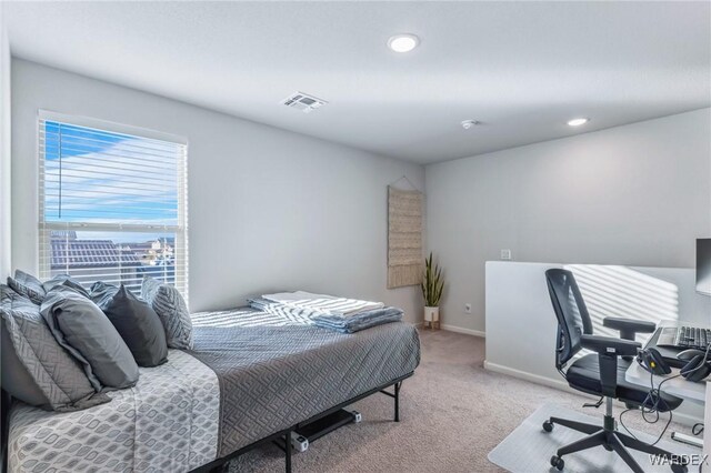 bedroom featuring baseboards, recessed lighting, visible vents, and light colored carpet