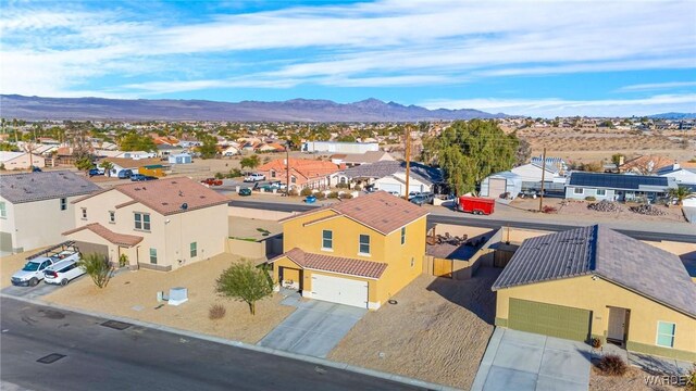 bird's eye view featuring a residential view and a mountain view