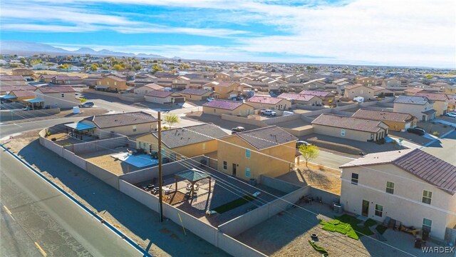 birds eye view of property with a residential view