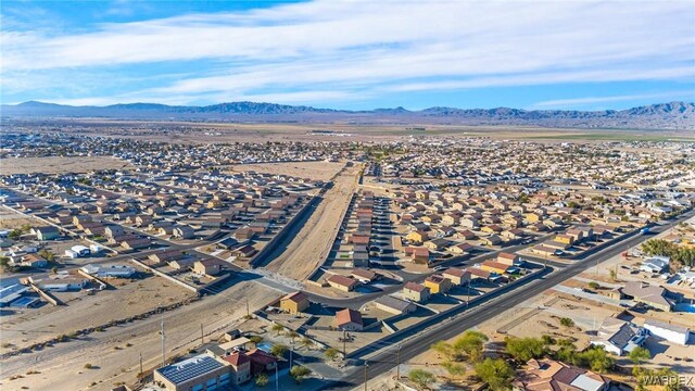 birds eye view of property with a residential view and a mountain view