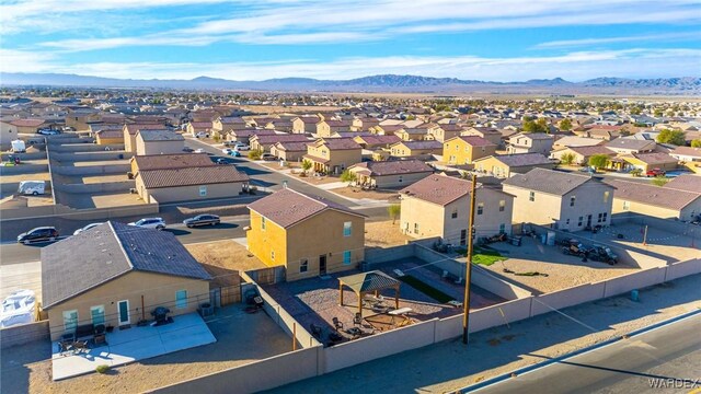 bird's eye view with a residential view and a mountain view