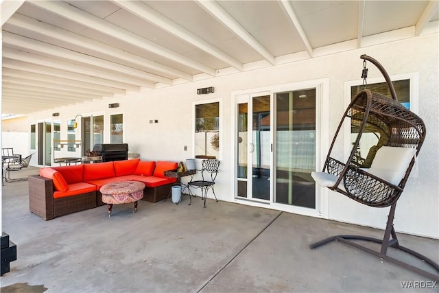 view of patio / terrace featuring an outdoor hangout area and a grill