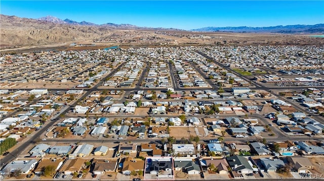 birds eye view of property featuring a residential view and a mountain view