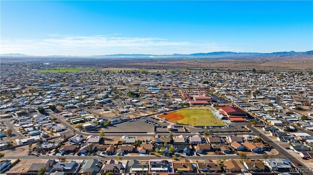 drone / aerial view with a residential view and a mountain view