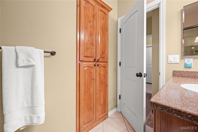 bathroom featuring tile patterned floors and vanity