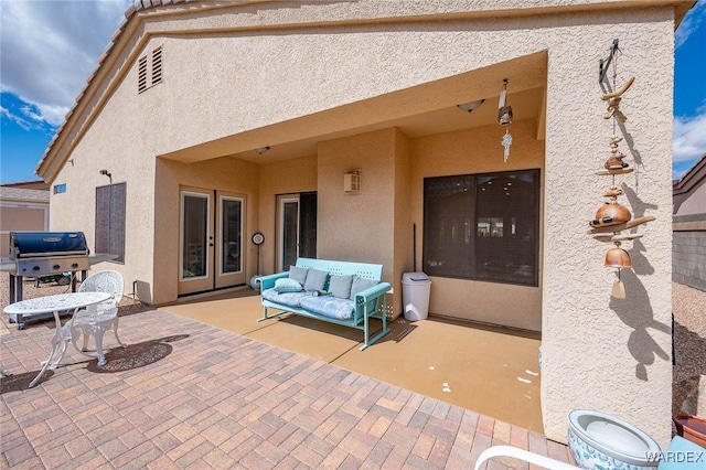 view of patio with grilling area and french doors