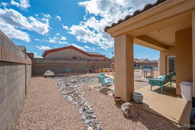 view of patio / terrace featuring a fenced backyard