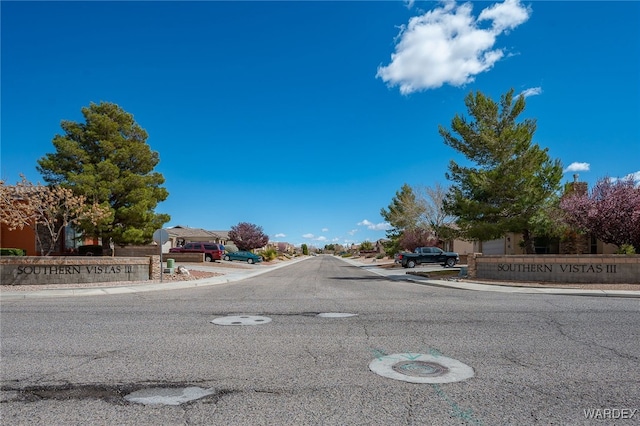 view of street featuring curbs