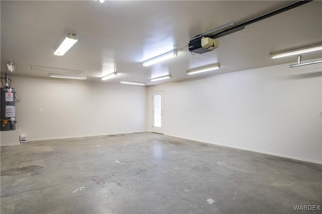 garage with water heater and baseboards