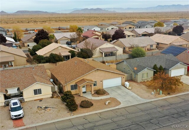 aerial view with a residential view and a mountain view