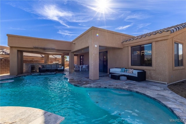 view of swimming pool with fence, outdoor lounge area, and a patio