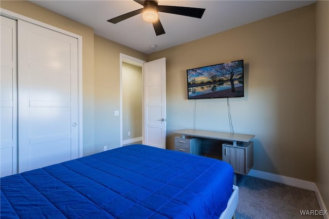 bedroom featuring carpet floors, a closet, baseboards, and a ceiling fan