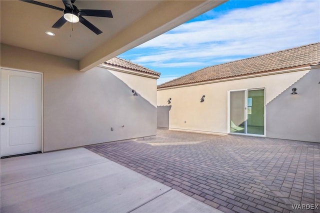 view of patio with ceiling fan