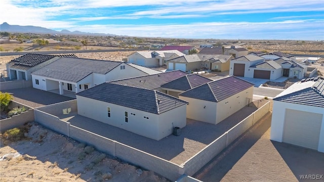 bird's eye view with a residential view and a mountain view