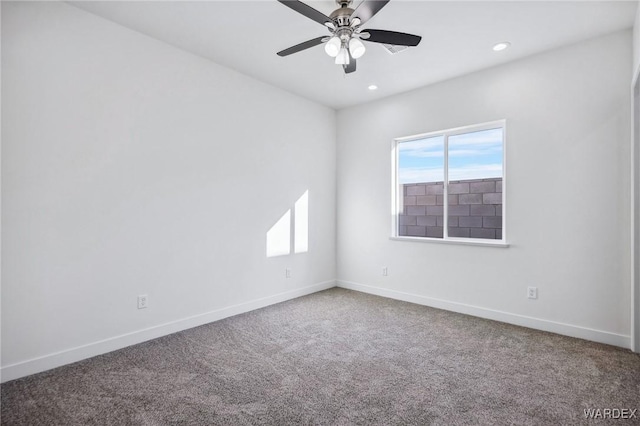 spare room featuring ceiling fan, carpet floors, recessed lighting, and baseboards