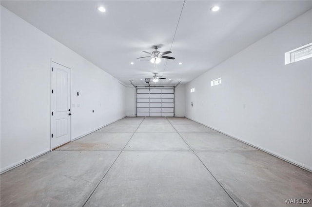 garage with a ceiling fan and recessed lighting