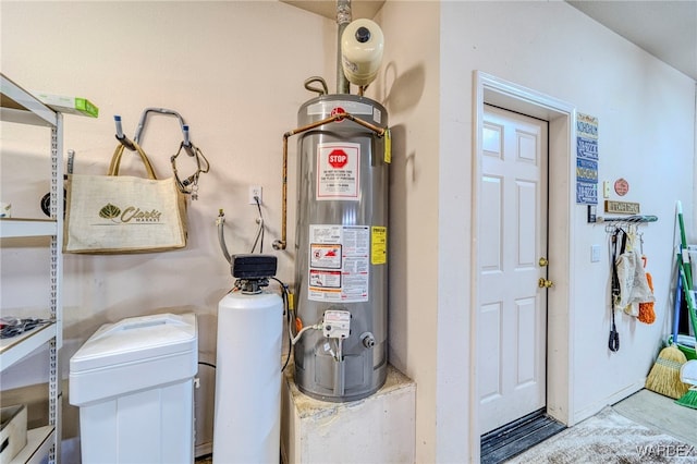 utility room with water heater