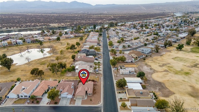 birds eye view of property featuring a residential view and a mountain view