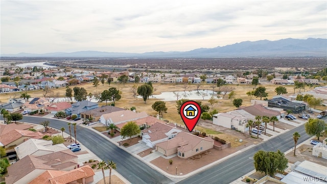 aerial view featuring a residential view and a mountain view