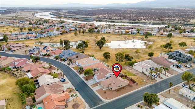 aerial view featuring a water view and a residential view