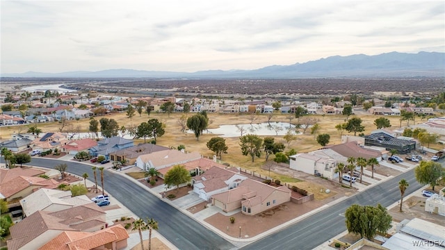 drone / aerial view with a residential view and a mountain view