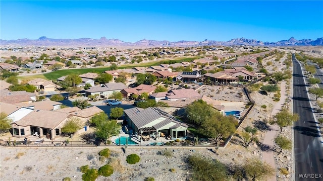 bird's eye view featuring a residential view and a mountain view