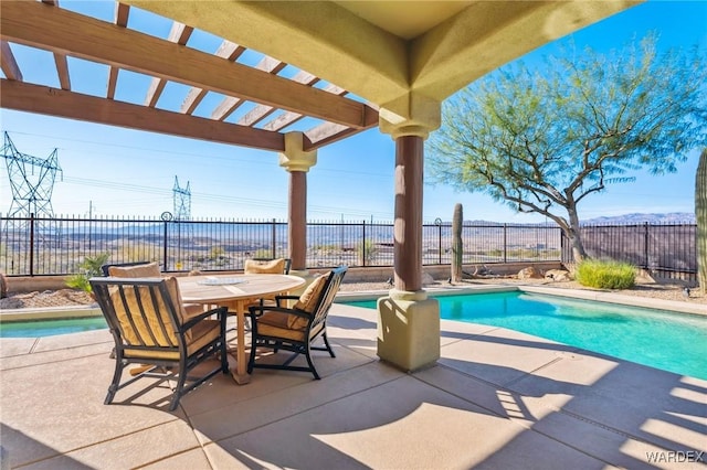 view of pool featuring a patio area, a fenced backyard, a fenced in pool, and a pergola