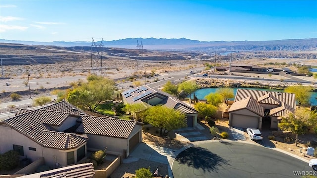 birds eye view of property featuring a residential view and a mountain view