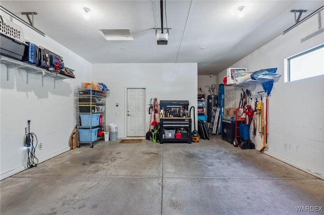 garage featuring a garage door opener