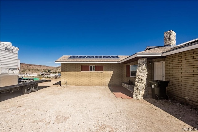 exterior space featuring a mountain view