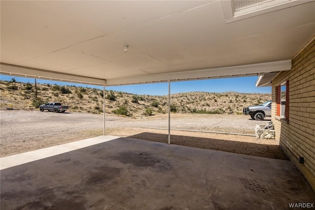 view of patio with a mountain view