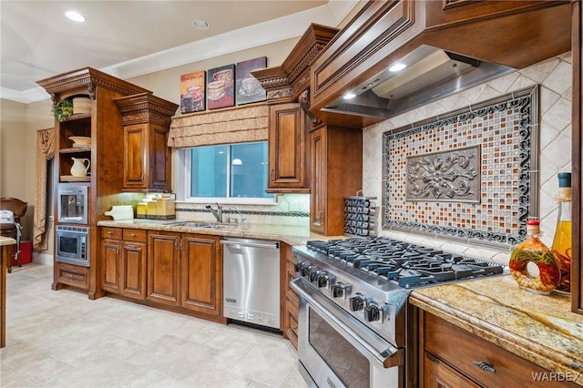 kitchen with a sink, appliances with stainless steel finishes, custom exhaust hood, decorative backsplash, and crown molding