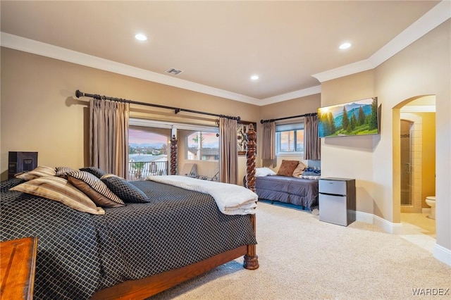 bedroom with arched walkways, light colored carpet, refrigerator, baseboards, and crown molding