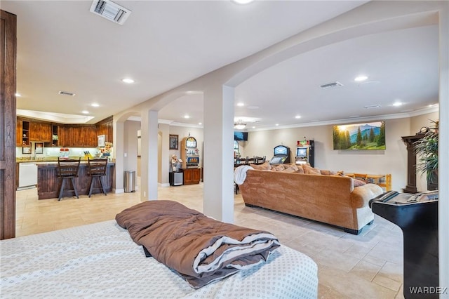 living room featuring arched walkways, recessed lighting, visible vents, and crown molding