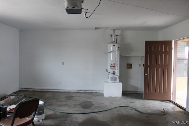 garage with water heater and a garage door opener