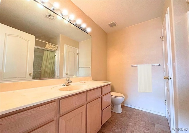 full bathroom with toilet, visible vents, walk in shower, and vanity