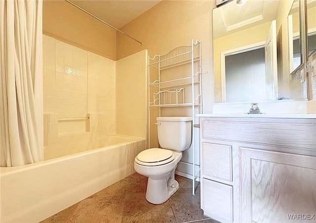 bathroom featuring shower / bath combination with curtain, tile patterned flooring, vanity, and toilet