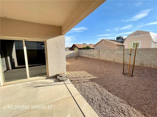 3371 N Apache St, Kingman, AZ 86401 - view of patio with a fenced backyard and cooling unit